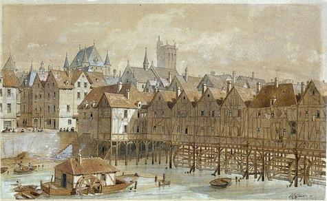 Un des ponts reliant la Cité à la Ville - en bois avec des maisons dessus.